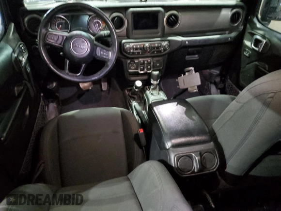 2021 Jeep Gladiator Willys with VIN 1C6HJTAG4ML556255, listed as a Copart auction lot 57143125 with 57,104 mi miles and Salvage title. Bid and sale history available at DreamBid. Image 8.