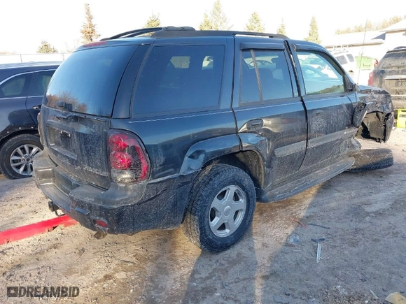 2003 Chevrolet TrailBlazer LS with VIN 1GNDT13S732132362, listed as a IAAI auction lot 41421559 with 59,104 mi miles. Bid and sale history available at carsss.com. Image 4.