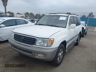 2001 Toyota Land Cruiser z VIN JTEHT05J412004663, wystawiony jako IAAI lot #42192078 z przebiegiem 358 917 mil mil oraz . Historia ofert i sprzedaży dostępna na DreamBid. Obrazek 2.
