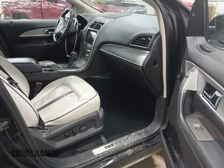 2014 Lincoln MKX with VIN 2LMDJ8JK4EBL16245, listed as a IAAI auction lot 42137824 with 184,479 mi miles. Bid and sale history available at carsss.com. Image 5.