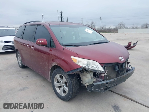 2014 Toyota Sienna LE AAS with VIN 5TDKK3DC6ES487962, listed as a IAAI auction lot 41568458 with 164,043 mi miles. Bid and sale history available at carsss.com. Image 1.