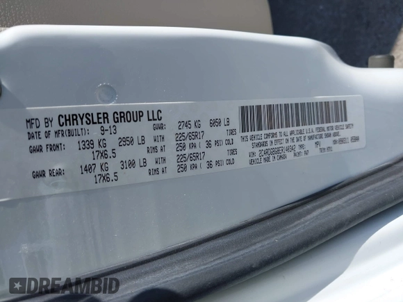 2014 Dodge Grand Caravan American Value with VIN 2C4RDGBG8ER140342, listed as a IAAI auction lot 42198306 with 135,564 mi miles and . Bid and sale history available at DreamBid. Image 9.
