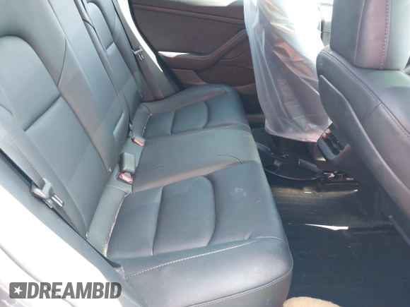 2022 Tesla Model 3 with VIN 5YJ3E1EA0NF344782, listed as a IAAI auction lot 41803469 with 16,973 mi miles and . Bid and sale history available at DreamBid. Image 8.