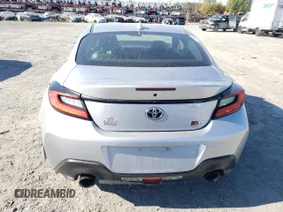 2023 Toyota GR86 with VIN JF1ZNBB16P9757703, listed as a Copart auction lot 73551444 with 17,676 mi miles and Salvage Title. Bid and sale history available at carsss.com. Image 6.