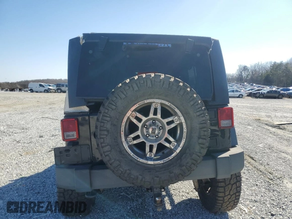 2014 Jeep Wrangler Unlimited Sport with VIN 1C4BJWDG9EL250326, listed as a Copart auction lot 48545705 with 247,460 mi miles and Salvage Title. Bid and sale history available at DreamBid. Image 6.