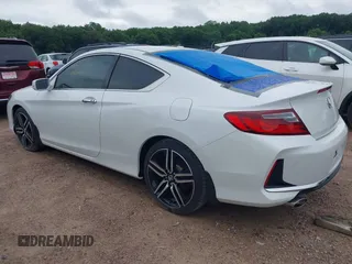 2016 Honda Accord Touring with VIN 1HGCT2B09GA007614, listed as a IAAI auction lot 42532621 with 200,935 mi miles and . Bid and sale history available at DreamBid. Image 3.
