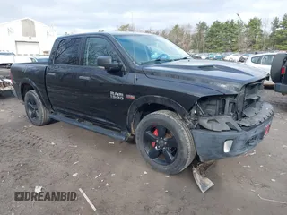 2015 Ram 1500 Outdoorsman z VIN 1C6RR7LTXFS652897, wystawiony jako IAAI lot #41913742 z przebiegiem 90 920 mil mil oraz . Historia ofert i sprzedaży dostępna na DreamBid. Obrazek 1.