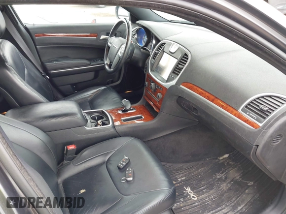2013 Chrysler 300 with VIN 2C3CCAAG9DH707447, listed as a IAAI auction lot 42292077 with 171,329 mi miles and . Bid and sale history available at DreamBid. Image 5.