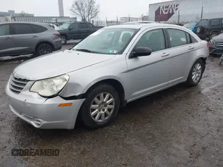 2010 Chrysler Sebring Touring z VIN 1C3CC4FB5AN128652, wystawiony jako IAAI lot #41863619 z przebiegiem 123 698 mil mil oraz . Historia ofert i sprzedaży dostępna na DreamBid. Obrazek 2.