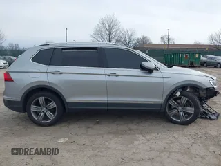 2020 Volkswagen Tiguan SE with VIN 3VV2B7AX6LM026760, listed as a IAAI auction lot 41652292 with 63,925 mi miles and . Bid and sale history available at DreamBid. Image 12.