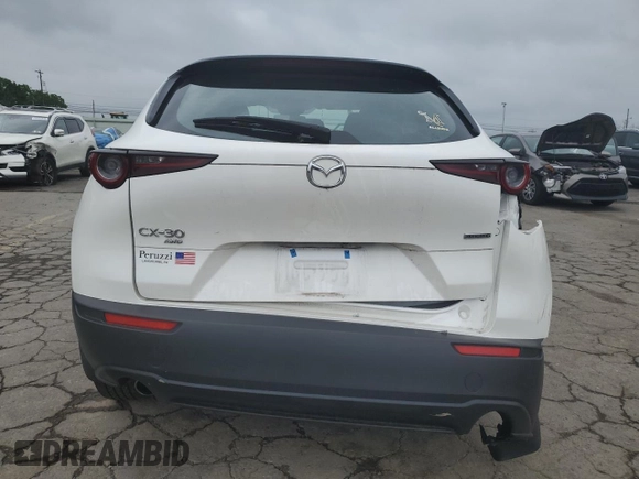 2023 Mazda CX-30 S with VIN 3MVDMBAM8PM557537, listed as a Copart auction lot 61154835 with 23,450 mi miles and Salvage title. Bid and sale history available at DreamBid. Image 6.