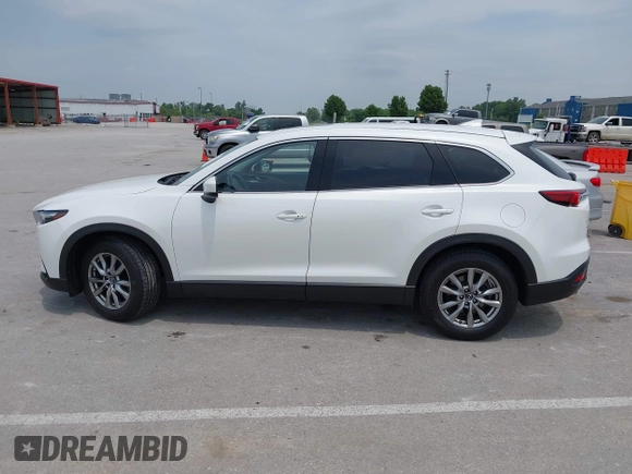 2019 Mazda CX-9 Touring with VIN JM3TCACY1K0334804, listed as a IAAI auction lot 42411662 with 49,447 mi miles and . Bid and sale history available at DreamBid. Image 14.
