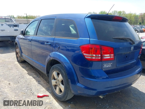 2009 Dodge Journey SXT with VIN 3D4GG57V89T551949, listed as a IAAI auction lot 41874310 with 170,084 mi miles. Bid and sale history available at carsss.com. Image 3.