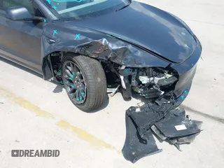 2024 Tesla Model 3 z VIN 5YJ3E1EAXRF864719, wystawiony jako IAAI lot #42129944 z przebiegiem 3 776 mil mil oraz . Historia ofert i sprzedaży dostępna na DreamBid. Obrazek 6.