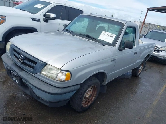 2003 Mazda B-Series 2WD Truck SX with VIN 4F4YR12D03TM16560, listed as a IAAI auction lot 41771702 with 94,027 mi miles. Bid and sale history available at carsss.com. Image 2.
