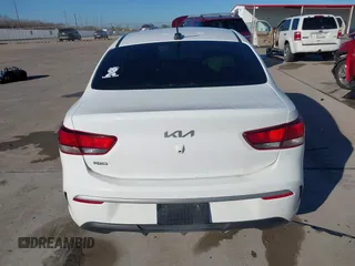 2023 Kia Rio S z VIN 3KPA24AD9PE567364, wystawiony jako IAAI lot #41145615 z przebiegiem 82 143 mil mil oraz . Historia ofert i sprzedaży dostępna na DreamBid. Obrazek 16.