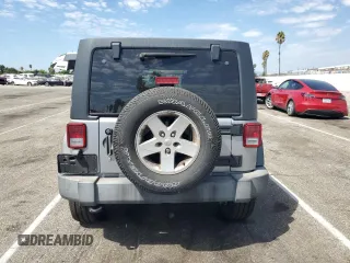 2018 Jeep Wrangler JK Unlimited Sport S with VIN 1C4BJWDG5JL811003, listed as a Copart auction lot 70633564 with 94,477 mi miles and Salvage Title. Bid and sale history available at carsss.com. Image 6.