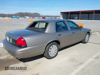 2010 Ford Police Interceptor with VIN 2FABP7BV1AX145319, listed as a IAAI auction lot 41828204 with Not provided miles and . Bid and sale history available at DreamBid. Image 4.
