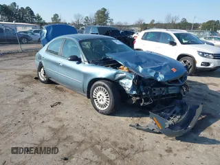 2005 Mercury Sable GS with VIN 1MEFM50U95A602863, listed as a IAAI auction lot 41409391 with 1 mi miles. Bid and sale history available at carsss.com. Image 1.