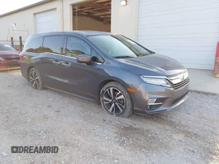 2019 Honda Odyssey Elite with VIN 5FNRL6H9XKB078665, listed as a IAAI auction lot 42013325 with 123,890 mi miles and . Bid and sale history available at DreamBid. Image 1.