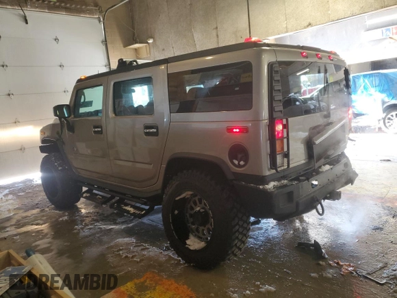 2004 Hummer H2 with VIN 5GRGN23U34H104465, listed as a Copart auction lot 41432055 with 154,346 mi miles and Salvage Title. Bid and sale history available at carsss.com. Image 2.