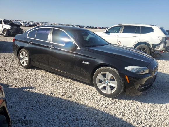 2012 BMW 5 Series 528i with VIN WBAXG5C55CDY30322, listed as a Copart auction lot 84326974 with 210,301 mi miles and Clean Title. Bid and sale history available at carsss.com. Image 4.