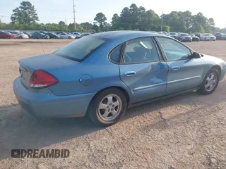 2006 Ford Taurus SE with VIN 1FAFP53U26A179541, listed as a IAAI auction lot 42000612 with 214,881 mi miles. Bid and sale history available at carsss.com. Image 4.