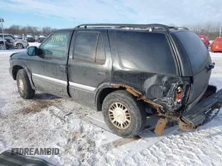 1999 GMC Jimmy SLE with VIN 1GKDT13W5X2520020, listed as a IAAI auction lot 41337936 with 277,615 mi miles. Bid and sale history available at carsss.com. Image 3.