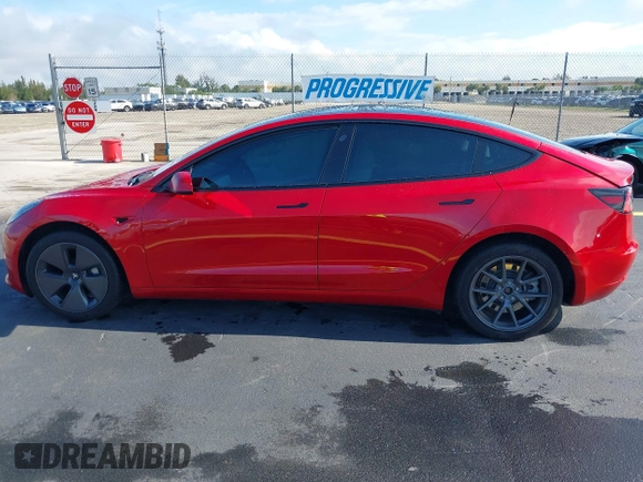 2023 Tesla Model 3 with VIN 5YJ3E1EA2PF588467, listed as a IAAI auction lot 42254921 with 11,217 mi miles and . Bid and sale history available at DreamBid. Image 15.