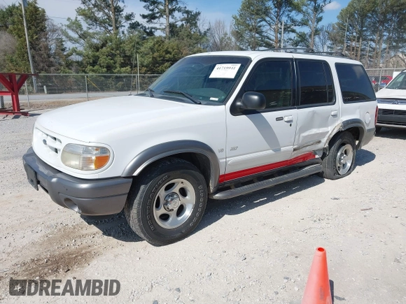 2000 Ford Explorer XLT z VIN 1FMZU83P4YUB84877, wystawiony jako IAAI lot #41719941 z przebiegiem 192 451 mil mil oraz . Historia ofert i sprzedaży dostępna na DreamBid. Obrazek 2.