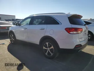 2016 Kia Sorento EX with VIN 5XYPH4A10GG055557, listed as a Copart auction lot 88999925 with 93,584 mi miles and Salvage Title. Bid and sale history available at DreamBid. Image 2.
