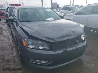 2015 Volkswagen Passat 1.8T Limited Edition with VIN 1VWAS7A32FC114666, listed as a IAAI auction lot 41650207 with 194,820 mi miles. Bid and sale history available at carsss.com. Image 1.