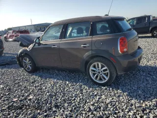 2011 MINI Countryman with VIN WMWZB3C53BWM00724, listed as a Copart auction lot 52293575 with Not Provided miles and Salvage Title. Bid and sale history available at DreamBid. Image 2.