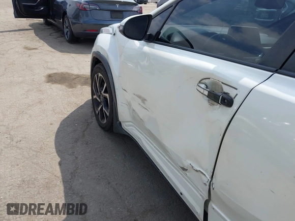 2019 Toyota C-HR XLE with VIN JTNKHMBX9K1054053, listed as a IAAI auction lot 42120256 with 67,083 mi miles and . Bid and sale history available at DreamBid. Image 6.