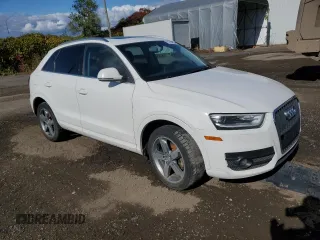 2015 Audi Q3 with VIN WA1EFEFS5FR009981, listed as a Copart auction lot 73714854 with 157,693 mi miles and Salvage title. Bid and sale history available at DreamBid. Image 4.