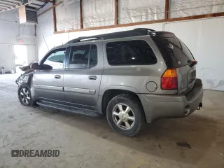 2004 GMC Envoy SLT with VIN 1GKET16S146222288, listed as a Copart auction lot 49316405 with 210,424 mi miles and Salvage Title. Bid and sale history available at DreamBid. Image 2.
