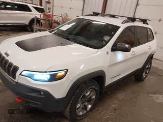 2019 Jeep Cherokee Trailhawk with VIN 1C4PJMBX4KD390061, listed as a IAAI auction lot 42007112 with 72,227 mi miles and . Bid and sale history available at DreamBid. Image 17.