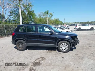 2017 Volkswagen Tiguan S with VIN WVGAV7AX5HK048843, listed as a IAAI auction lot 42029583 with 73,892 mi miles and . Bid and sale history available at DreamBid. Image 14.