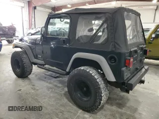 2006 Jeep Wrangler SE with VIN 1J4FA29S36P724699, listed as a Copart auction lot 41764425 with 129,016 mi miles and Salvage Title. Bid and sale history available at carsss.com. Image 2.