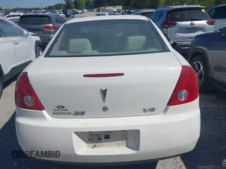 2006 Pontiac G6 6-Cyl z VIN 1G2ZG558264213214, wystawiony jako IAAI lot #42044349 z przebiegiem 138 725 mil mil oraz . Historia ofert i sprzedaży dostępna na DreamBid. Obrazek 16.