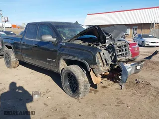 2015 GMC Sierra 1500 SLE with VIN 1GTV2UEC2FZ205267, listed as a IAAI auction lot 41593807 with 194,921 mi miles. Bid and sale history available at carsss.com. Image 1.