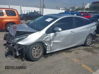 2018 Toyota Prius Two with VIN JTDKARFU2J3554502, listed as a IAAI auction lot 41592780 with 119,210 mi miles. Bid and sale history available at carsss.com. Image 2.