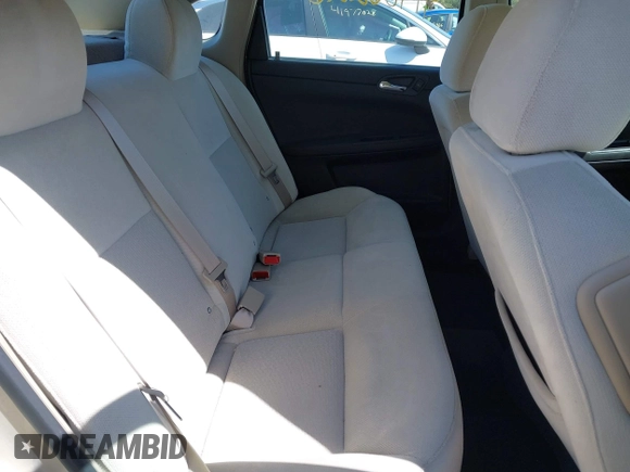 2012 Chevrolet Impala LS Retail with VIN 2G1WA5E35C1206391, listed as a IAAI auction lot 41986220 with 55,644 mi miles and . Bid and sale history available at DreamBid. Image 8.