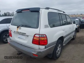 2001 Toyota Land Cruiser z VIN JTEHT05J412004663, wystawiony jako IAAI lot #42192078 z przebiegiem 358 917 mil mil oraz . Historia ofert i sprzedaży dostępna na DreamBid. Obrazek 4.