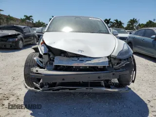 2023 Tesla Model Y Long Range with VIN 7SAYGDEEXPF770800, listed as a Copart auction lot 48324515 with 25,205 mi miles and Salvage Title. Bid and sale history available at DreamBid. Image 5.