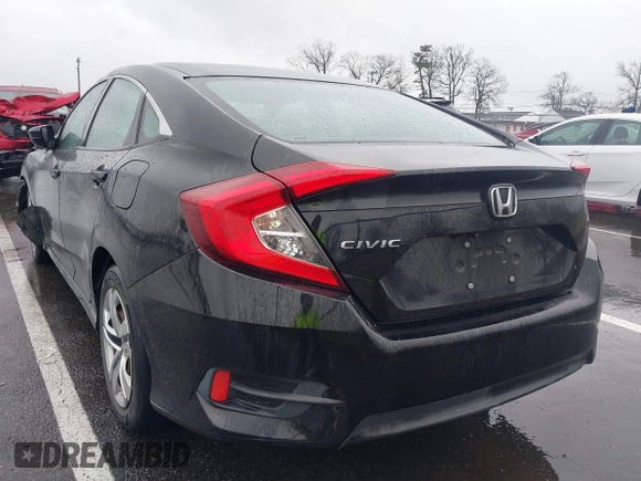 2018 Honda Civic LX with VIN 2HGFC2F54JH548274, listed as a IAAI auction lot 41864457 with 60,905 mi miles and . Bid and sale history available at DreamBid. Image 3.