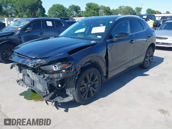 2021 Mazda CX-30 Premium with VIN 3MVDMBDYXMM307047, listed as a IAAI auction lot 41974966 with 53,409 mi miles and . Bid and sale history available at carsss.com. Image 20.