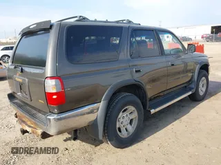 1998 Toyota 4Runner SR5 with VIN JT3HN86R2W0155266, listed as a IAAI auction lot 42111027 with 215,979 mi miles and . Bid and sale history available at DreamBid. Image 4.