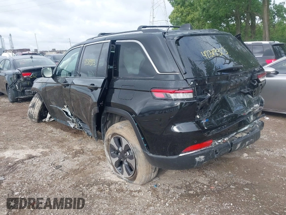 2022 Jeep Grand Cherokee with VIN 1C4RJYB69N8715243, listed as a IAAI auction lot 42319323 with 23,405 mi miles and . Bid and sale history available at DreamBid. Image 3.