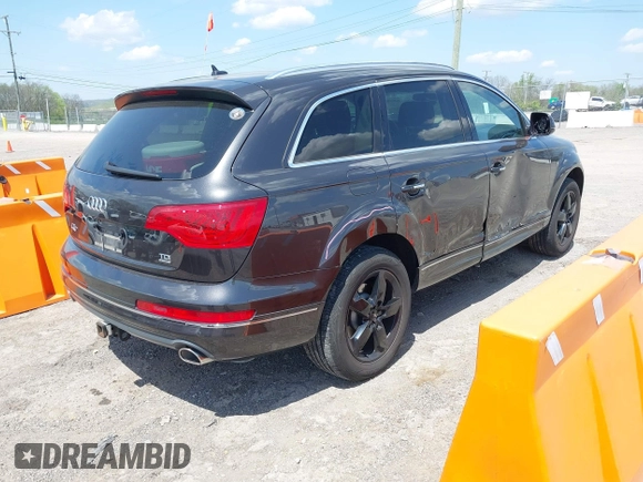 2014 Audi Q7 Premium Plus with VIN WA1LMAFE5ED020880, listed as a IAAI auction lot 42010201 with 123,384 mi miles and . Bid and sale history available at DreamBid. Image 4.